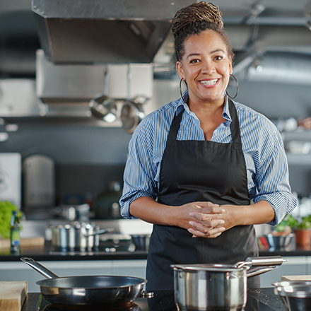 Chef in his kitchen looking at the camera